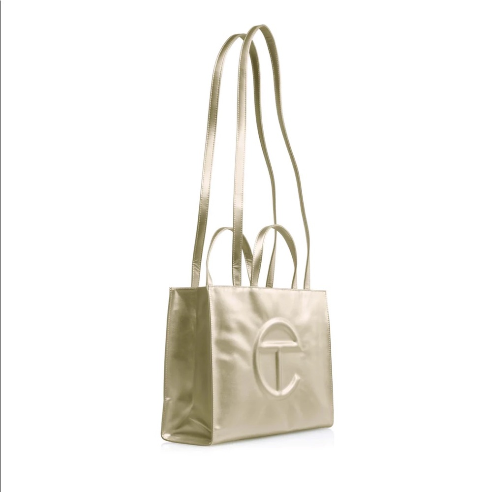 Telfar medium gold shopping bag